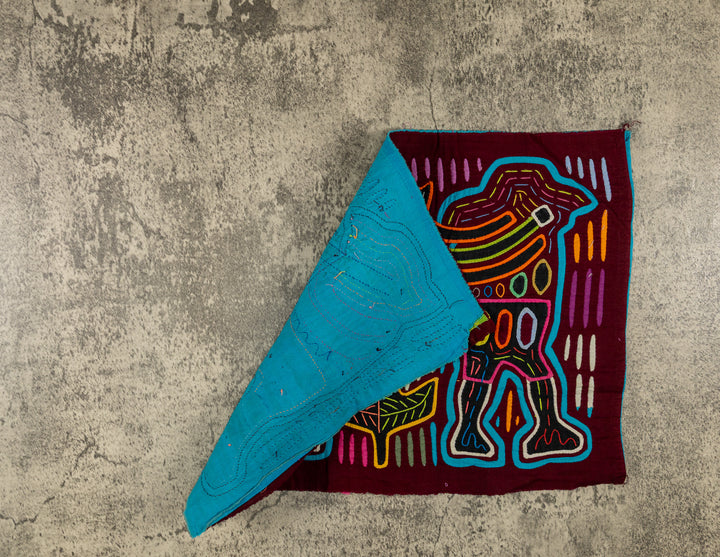Maroon And Turquoise Playing The Flute Mola