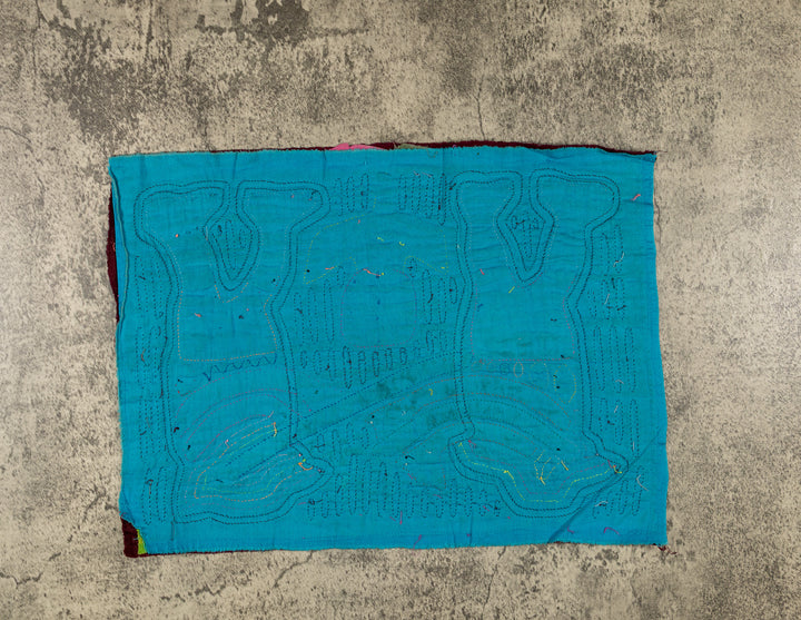 Maroon And Turquoise Playing The Flute Mola