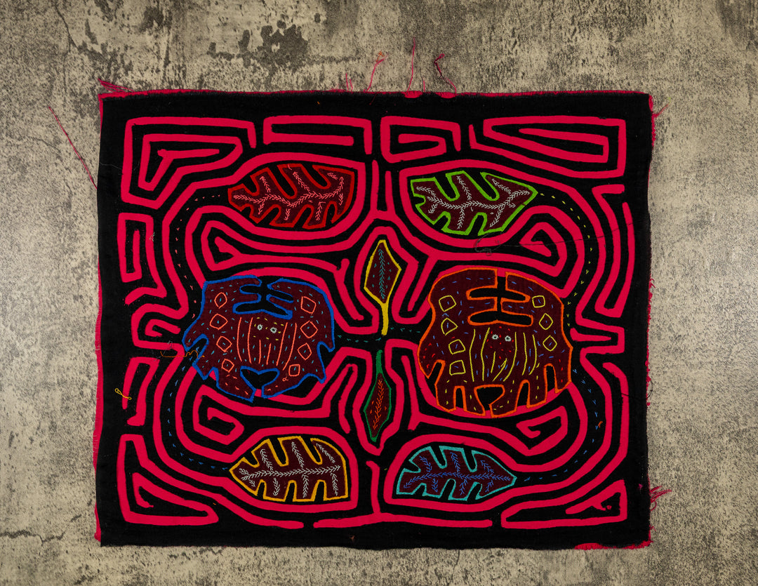 Panama mola panel, two round crabs with stitched shells among leaves in a pink maze on black, hand stitched reverse applique