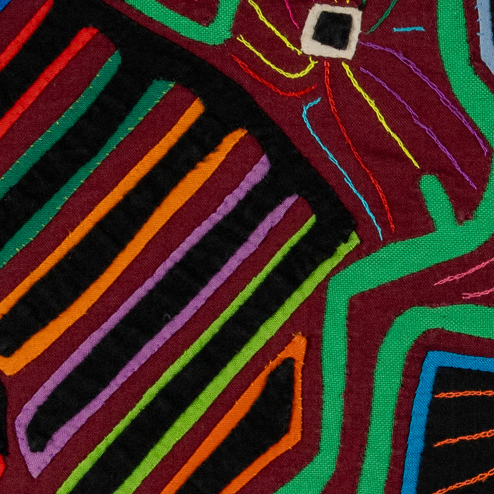 Two green herons watching the fish mola, hand stitched Guna panel from Panama, 16 by 13 inches