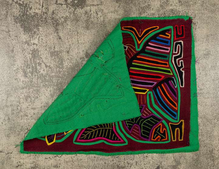 Hand stitched Guna mola from Guna Yala Panama, fish swimming along the lower edge below the birds
