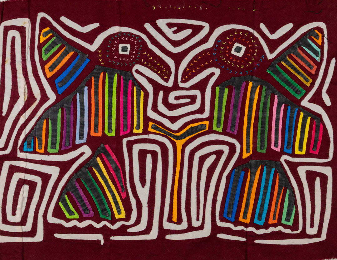 Maroon And White Two Bird In flight Mola