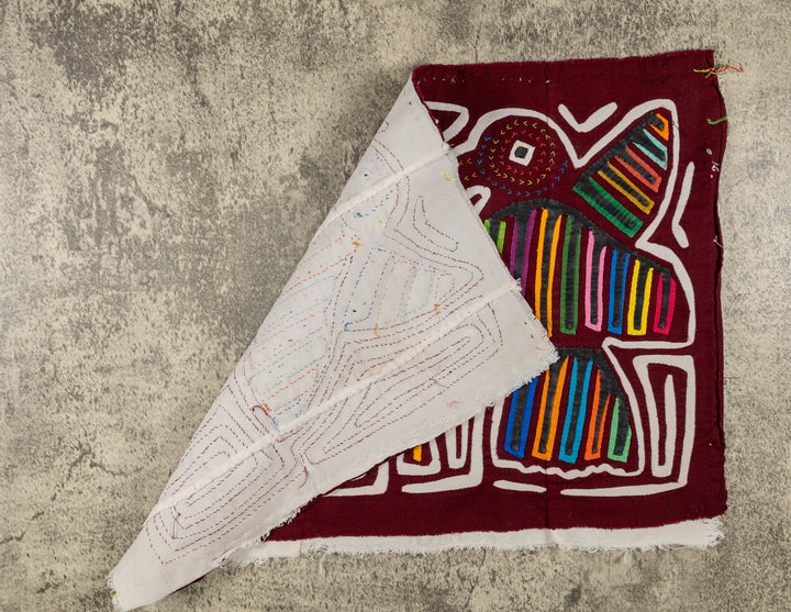 Maroon And White Two Bird In flight Mola
