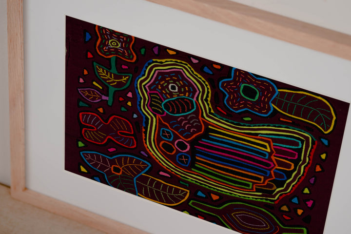 Hand stitched Guna mola from Guna Yala Panama, tiny triangles scattered across the background