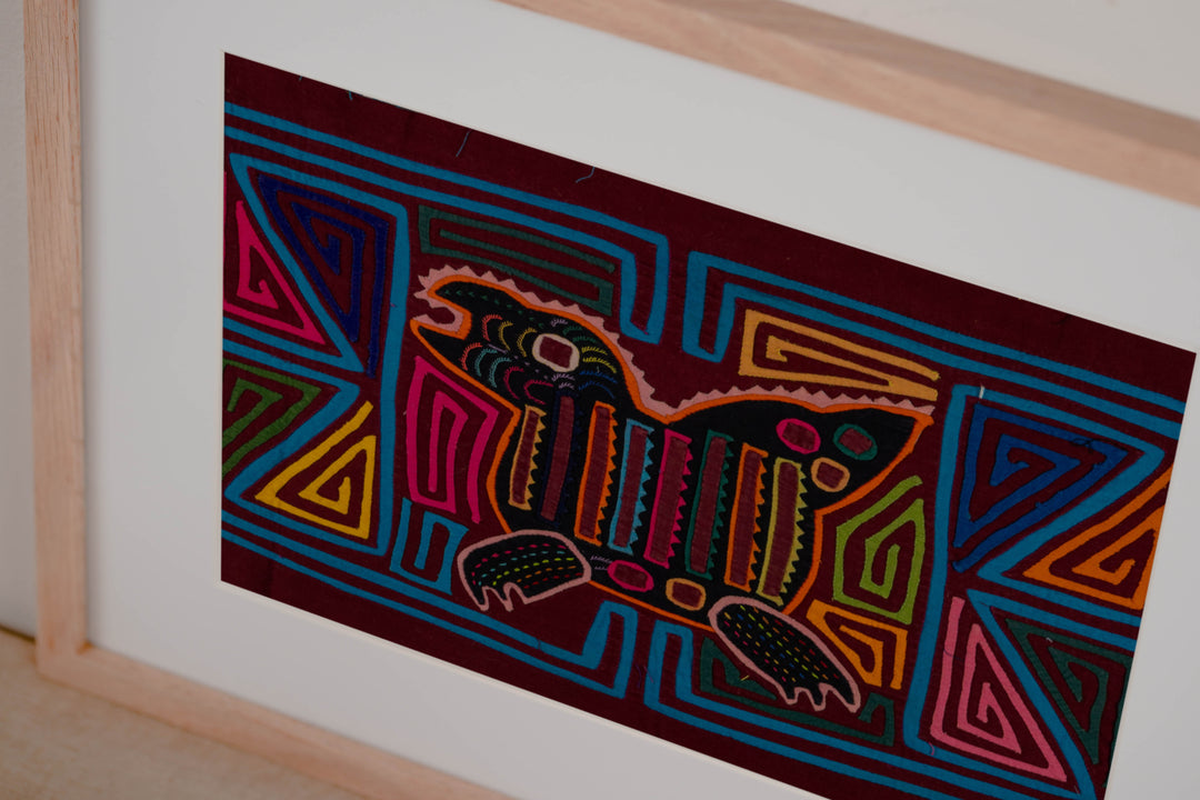 Hand stitched Guna mola from Guna Yala Panama, triangle spirals on both sides