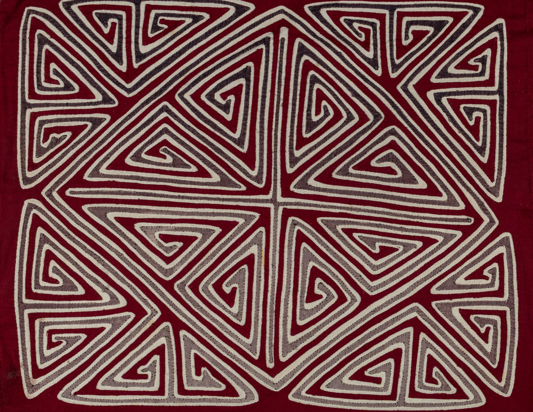 Spiral triangles in a big X mola, hand stitched Guna panel from Panama, 16 by 13.5 inches