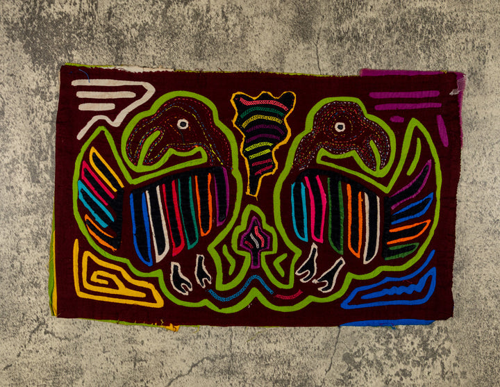 Maroon And Green Buzzard Bird Mola