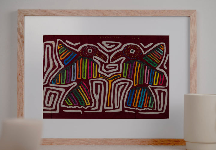 Maroon And White Two Bird In flight Mola