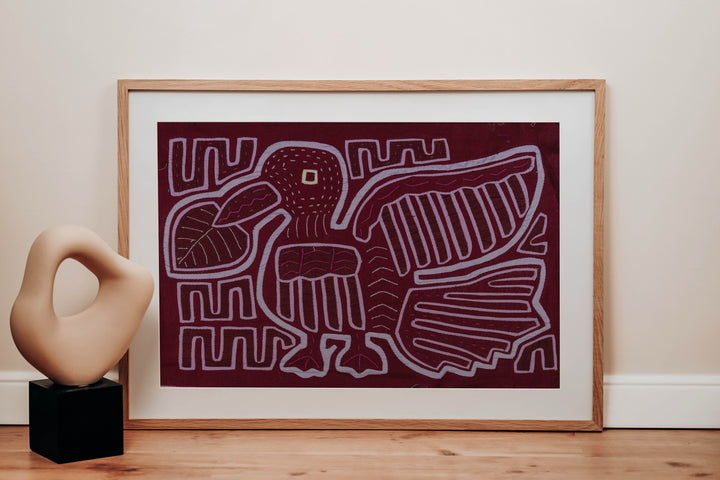 Panama mola panel, duck bird with wings opened wide in lavender outline on maroon, hand stitched reverse applique