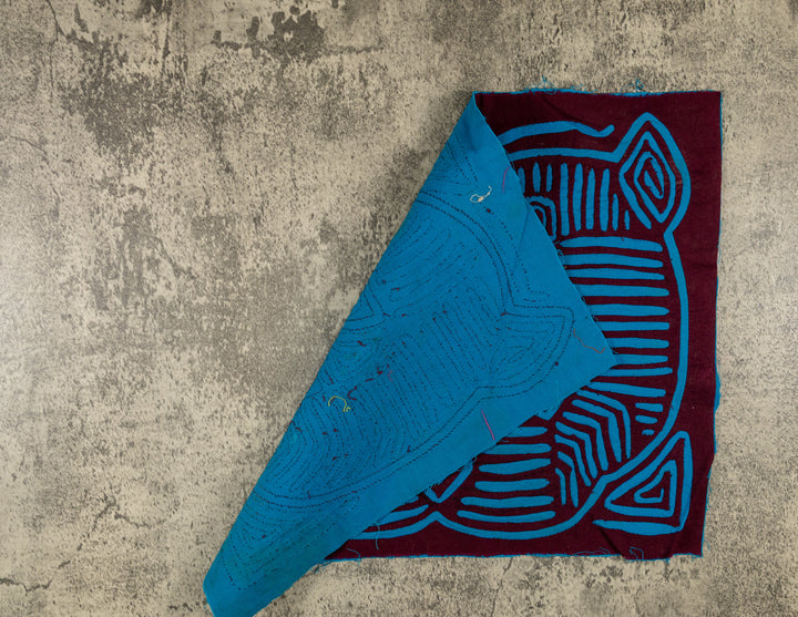 Hand stitched Guna mola from Guna Yala Panama, shapes that read two ways depending on how you look