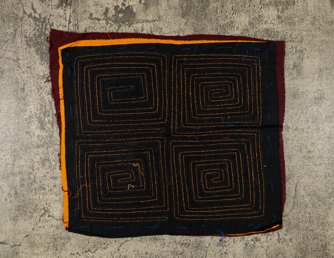 Four square spirals mola, hand stitched Guna panel from Panama, 14.5 by 13 inches