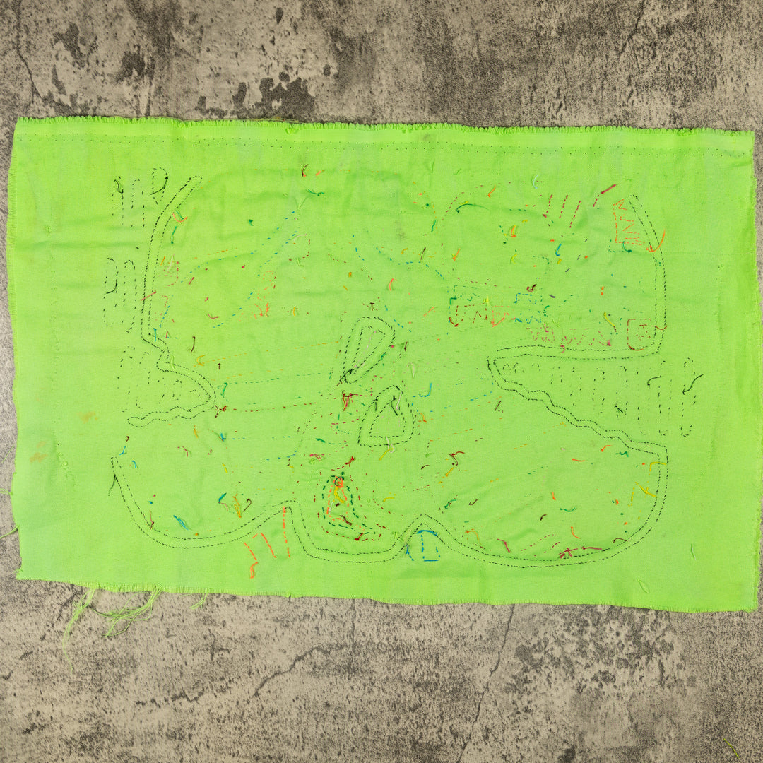 Green macaw mola, hand stitched Guna panel from Panama, 17 by 11 inches