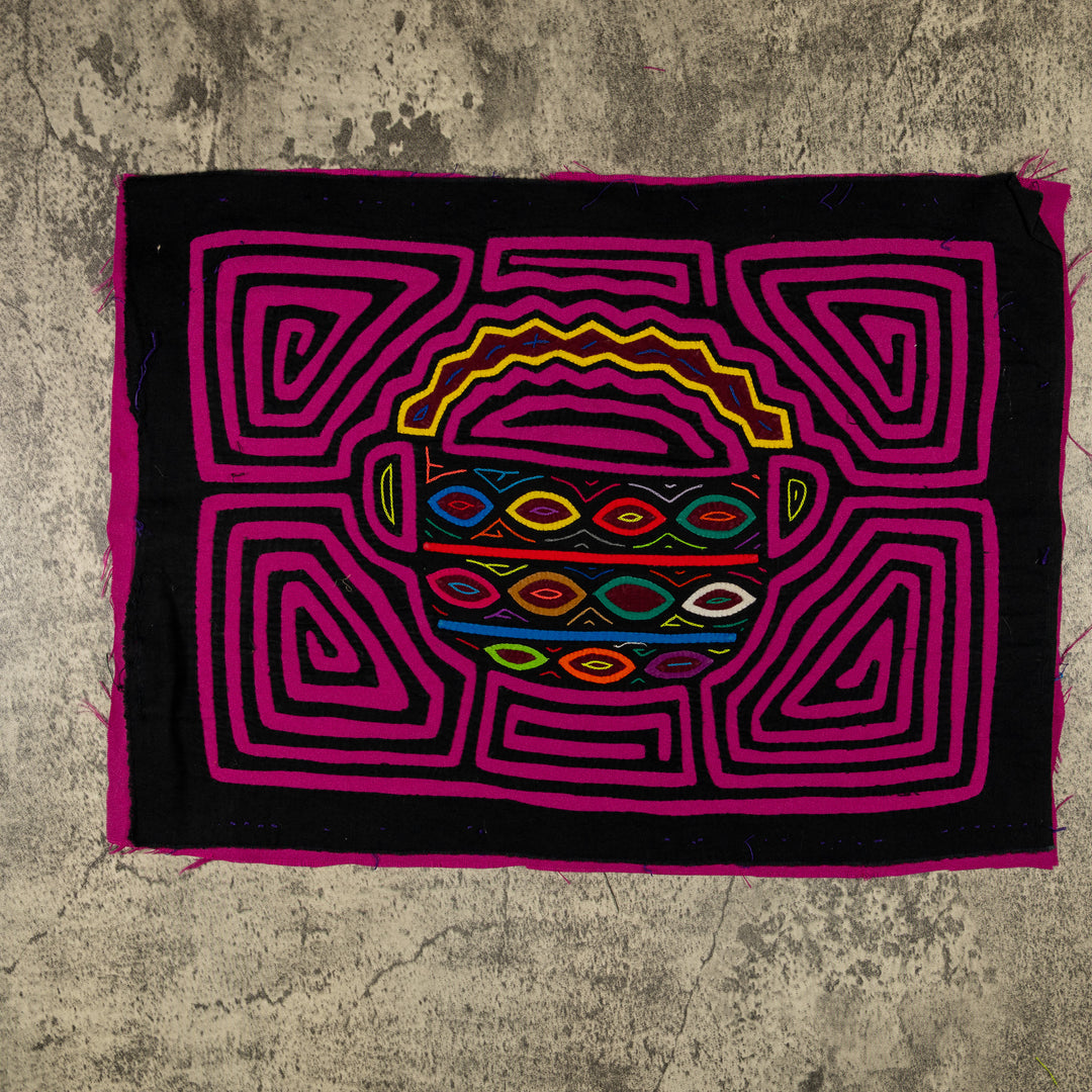 Panama mola panel, basket piled with eggs in magenta, pink and red on black, hand stitched reverse applique
