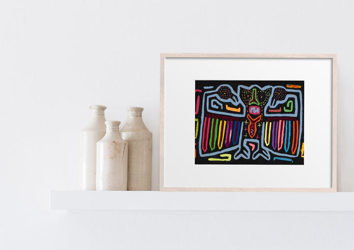 Panama mola panel, central figure with rainbow wings on black, hand stitched reverse applique