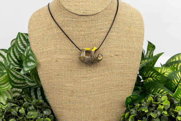 Grey sloth tagua on linen display