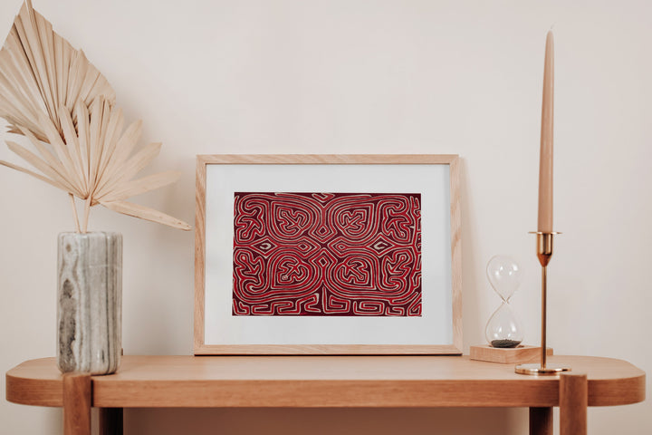 Hand stitched Guna mola from Guna Yala Panama, red and white lines with a key border
