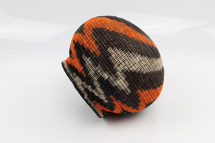 Panama Hand woven black and orange basket. palm fiber. natural dyes.