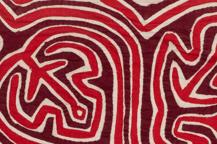 Hand stitched Guna mola from Guna Yala Panama, red and white lines with a key border