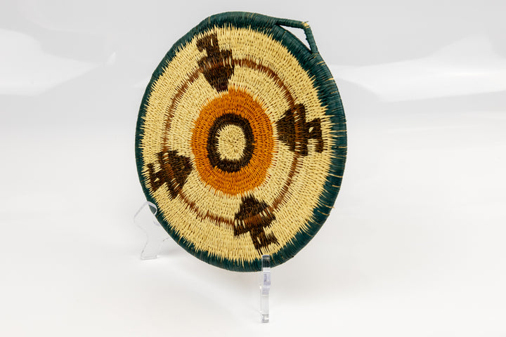 Hand woven plate basket from Panama. blue, gold, brown and white colors. Wall decoration. Indigenous artists Panama.