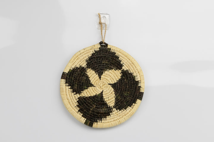 Hand woven plate basket from Panama. black colors. Wall decoration. Indigenous artists Panama.